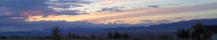 Wind blowing clouds across a Kittitas Valley sunset.