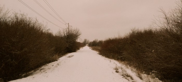 Photo of a snowy rural road